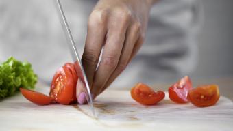 chopping tomatoes