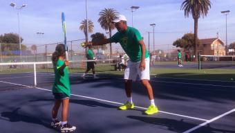 Marty Woods teaching tennis