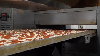 World's Largest Pizza going into the oven