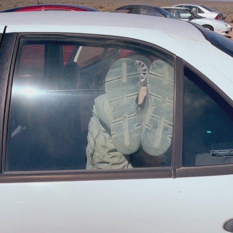 Jason Hanson demonstrating how to kick a car window