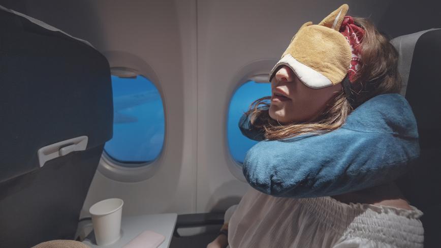 sleeping on plane