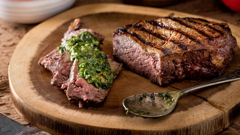 chimichurri sauce on meat